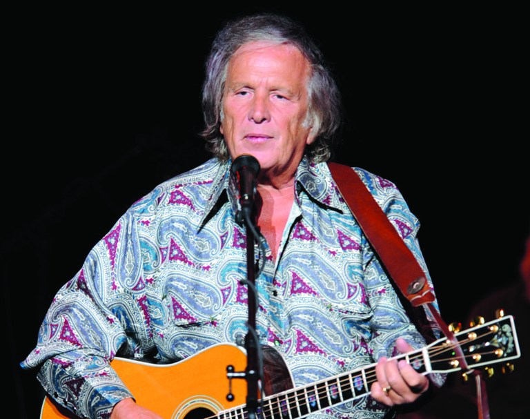 In this Juy 3, 2012 file photo provided by the Las Vegas News Bureau, Don McLean performs at the Las Vegas Hotel and Casino in Las Vegas. McLean has been fined $400 for driving his Chrysler too fast through a school zone in Maine and has paid the levy. He had contested the charge in September, saying school zone warning lights weren't flashing. He had requested a trial. Police said during a 40-minute proceeding in Rockland District Court on Thursday, Jan. 24, 2013, the warning lights were flashing. Judge Patricia Worth found McLean had been speeding in a school zone in Rockport. But she lowered what would be a $515 fine if uncontested to $400. McLean immediately paid up. McLean lives in nearby Camden, along Maine's coast. (Photo/Las Vegas News Bureau, Darrin Bush)
