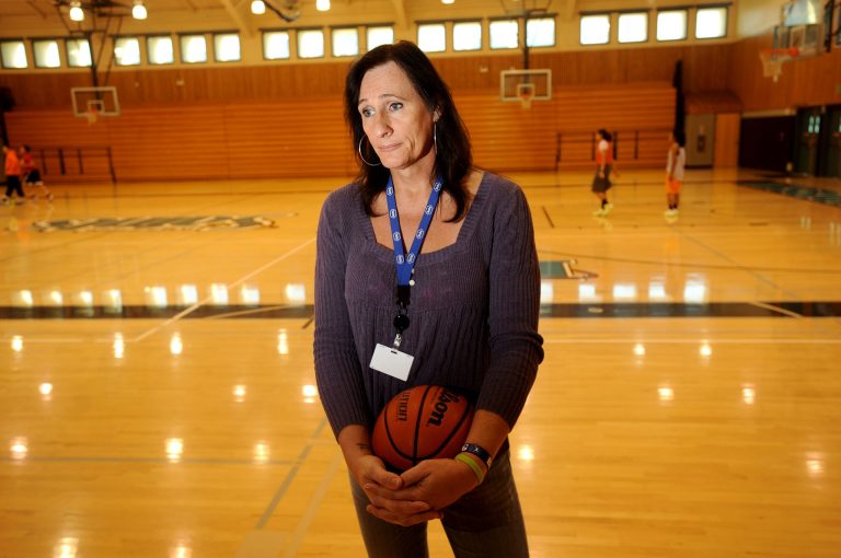   Gabrielle Ludwig, a 6-foot-6-inch transsexual player on Mission College's women's basketball squad, reflects on her return to college ball on Friday, Dec. 7, 2012, in Santa Clara, Calif. Gabrielle Ludwig made sports history this month as a basketball player at a Northern California community college. The 50-year-old transsexual, Army veteran, father and Mission College freshman is believed to be the first hoopster to play college ball as both a man and a woman. (AP Photo/Noah Berger)  