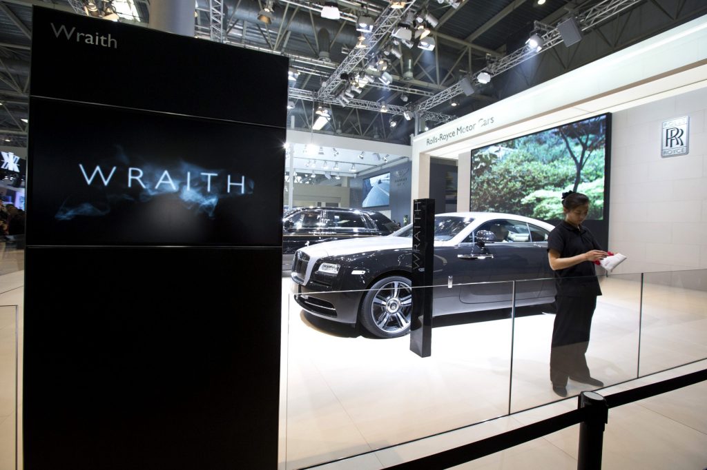 Luxury automakers scramble to woo young Chinese