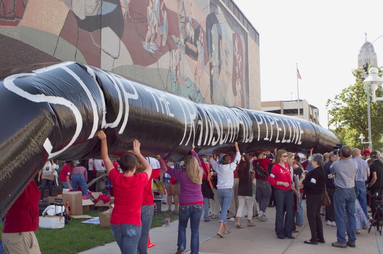 The privately-funded $7 billion Keystone XL Pipeline project should have created over 13,000 construction jobs already, according to President Obama's economic advisers. Those jobs don't yet exist, however, because the project is tied up in red tape amid protests. (AP Photo/Nati Harnik)