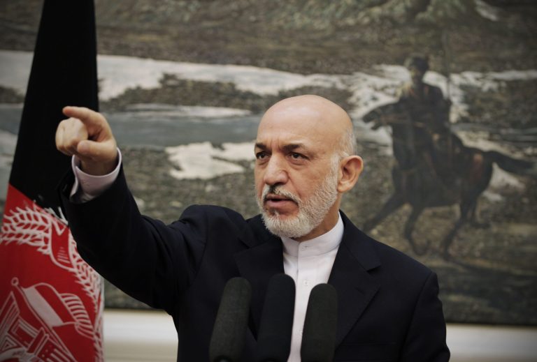   Afghan President Hamid Karzai takes a question during a press conference at the presidential palace in Kabul, Afghanistan, Tuesday, June 12, 2012. Afghan President Hamid Karzai is taking a defiant stand against NATO airstrikes, saying the military coalition can no longer fire on homes from aircraft in any circumstance even in defense of Afghan and foreign forces. (AP Photo/Ahmad Jamshid)  