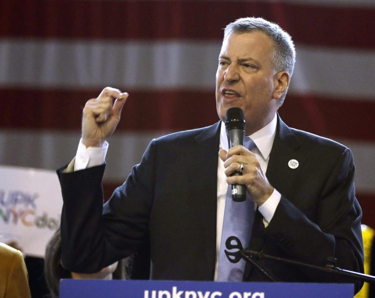 FILE- In this March 4, 2014, file photo, New York City Mayor Bill de Blasio speaks during a rally at the Washington Avenue Armory in Albany, N.Y. Now that state lawmakers are closing in on a plan to fund pre-kindergarten in New York City, Mayor Bill de Blasio is ready to turn to the next items on his sweeping liberal agenda: massively expanding affordable housing, hiking wages for the working class and overhauling the city's recovery from Superstorm Sandy. (AP Photo/Mike Groll, File)