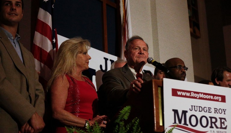 Ed Henry, the Alabama state representative, said he doesn't believe Moore's accusers. (AP Photo/Brynn Anderson)