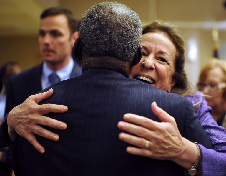 Democratic candidate Elizabeth Colbert Busch, right, hugs a supporter after the 1st Congressional District debate on Monday, April 29, 2013 in Charleston S.C. (AP Photo/Rainier Ehrhardt)