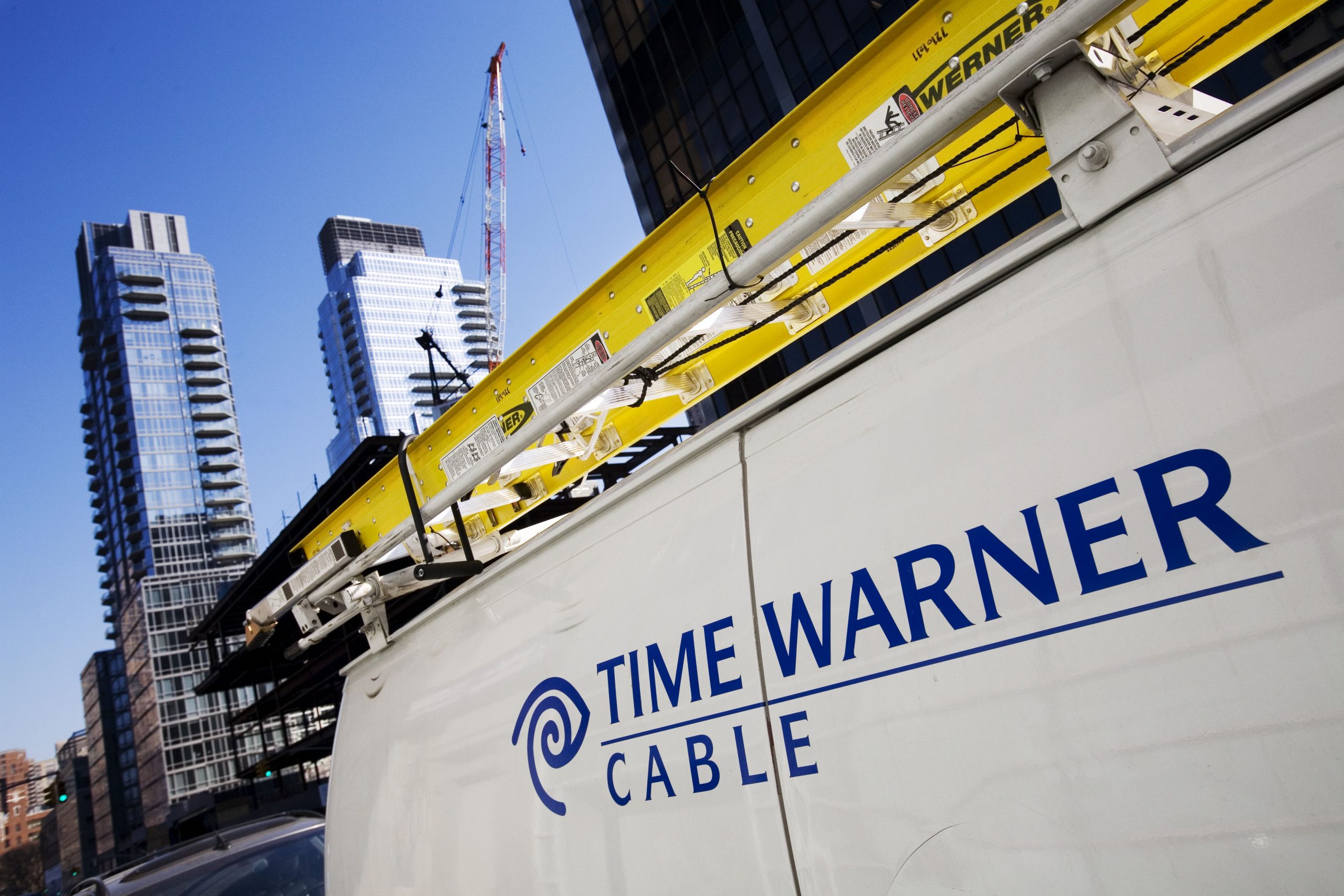 News Summary: Time Warner 4Q net falls 12 pct