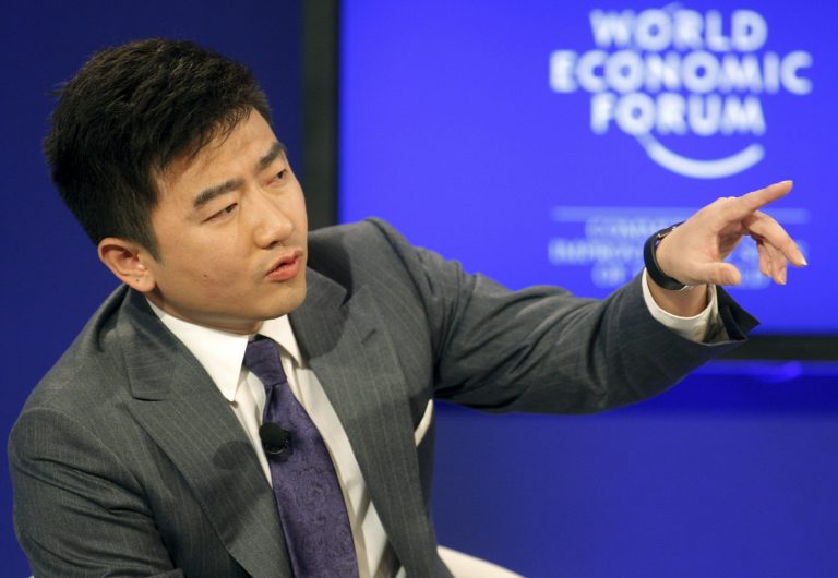 Director and Anchor, China Central Television, Rui Chenggang moderates a session at the World Economic Forum in Davos, Switzerland on Saturday, Jan. 29, 2011. More than two dozen senior officials from key economies will try Saturday to agree on whether to send a political signal that a new global trade deal can, at last, be completed this year as the World Economic Forum gradually comes to a close. (AP Photo/Michel Euler)