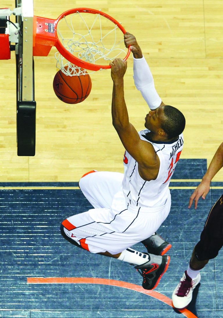 Andrew Shurtleff/The Daily Progress via AP
Akil Mitchell and Virginia have won three ACC games in a row by at least 14 points for the first time in 30 years.