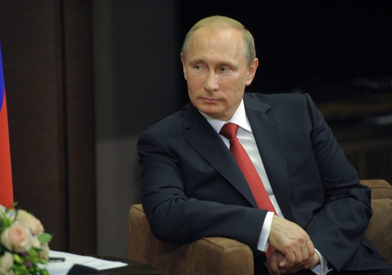 Russian President Vladimir Putin listens during a meeting with Egyptian President Abdel-Fattah el-Sissi in the Russian Black Sea resort of Sochi, Russia, on Tuesday. (AP/RIA Novosti)