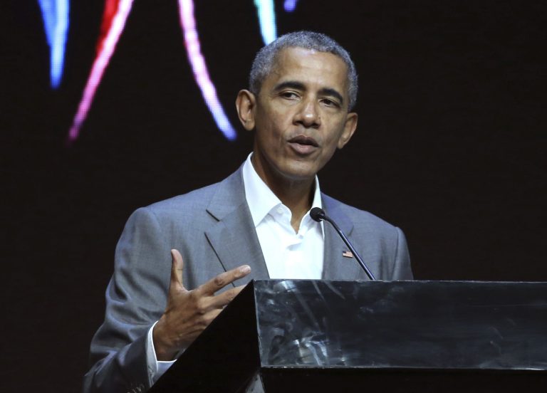 Former President Barack Obama called John McCain an American hero. (AP Photo/Achmad Ibrahim)