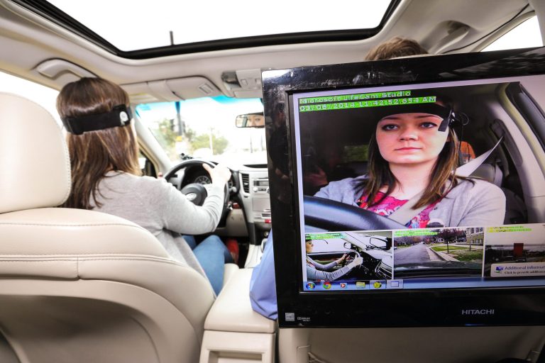 This March 6, 2014, image provided by AAA Foundation via DanCampbellPhotography.com shows driver during the Cognitive Distraction Phase II testing in Salt Lake City. Two new studies have found that voice-activated smartphones and dashboard infotainment systems may be making the distracted-driving problem worse. (AP Photo/DanCampbellPhotographer.com via AAA Foundation)