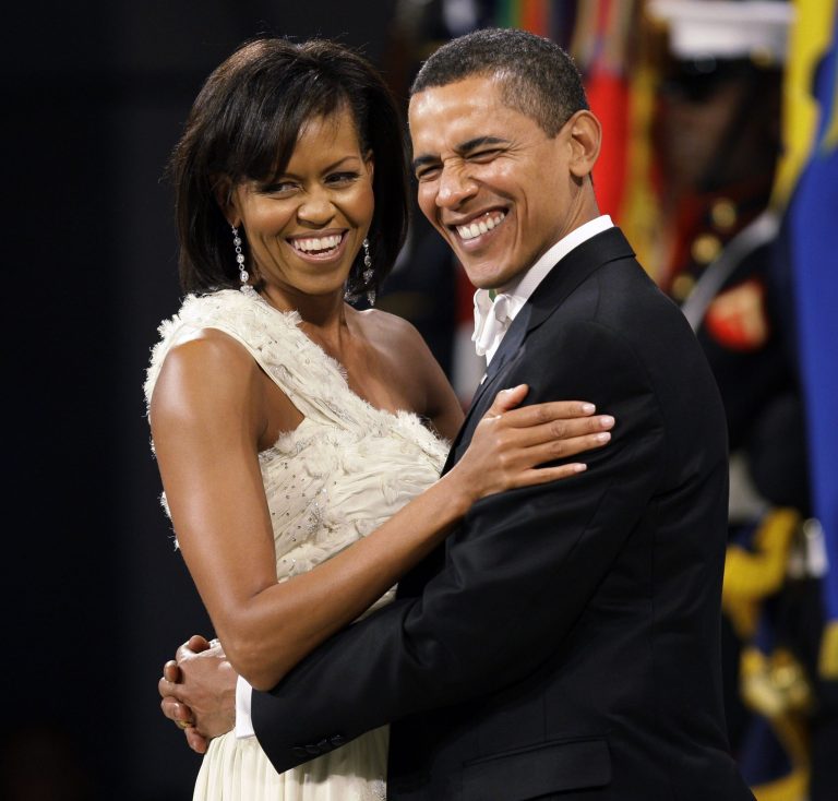   FILE - In this Jan. 20, 2009 file photo, President Barack Obama dances with first lady Michelle Obama at the Western Inaugural Ball in Washington. President Obama is restricting the inaugural balls to the lowest number in 60 years with just two official parties plus a concert honoring military families planned for next month. (AP Photo/Charlie Neibergall)  