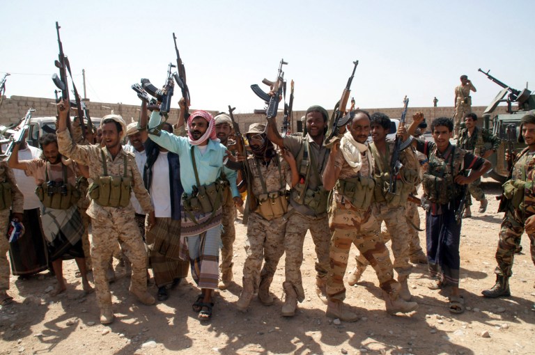 Yemen army soldiers celebrate after re-taking the province of Shabwa from al Qaeda in May. Critics say al Qaeda still has too much influence in Yemen. (AP Photo/Yemen's Defense Ministry)