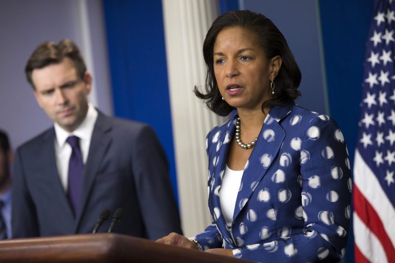 White House press security Josh Earnest, left, looks on as National Security Adviser Susan Rice gives a briefing on President Barack Obama's upcoming trip to Kenya and Ethiopia during the daily press briefing, on Wednesday, July 22, 2015, in Washington. (AP Photo/Evan Vucci)