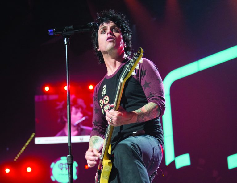 FILE - This Sept. 21, 2012 file photo released by Clear Channel shows Billie Joe Armstrong of Green Day performing at the 2012 iHeartRadio Music Festival at the MGM Grand Garden Arena in Las Vegas, Nev. Green Day announced Monday, Oct. 29, 2012, they will cancel their club tour that was due to launch in Seattle at the Paramount Theatre on Sept. 26 and wind down in Tempe, Ariz., at the Marquee Theatre on Dec. 10. The announcement comes over a month after the band's front man Billie Joe Armstrong headed into treatment for substance abuse. (AP Photo/Clear Channel, Andrew Swartz, file)