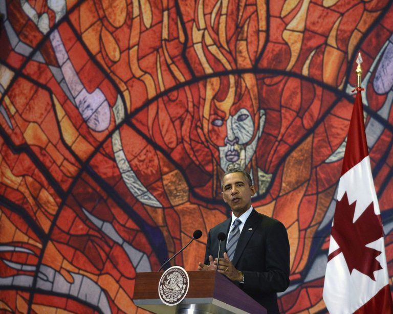 President Barack Obama speaks at the North American Leaders Summit closing news conference in Toluca, Mexico, Wednesday, Feb. 19, 2014. Obama was in Toluca for a one-day summit with Mexican and Canadian leaders, meeting on issues of trade and other neighbor-to-neighbor interests, even as Congress is pushing back against some of his top cross-border agenda items. (AP Photo/The Canadian Press, Sean Kilpatrick)