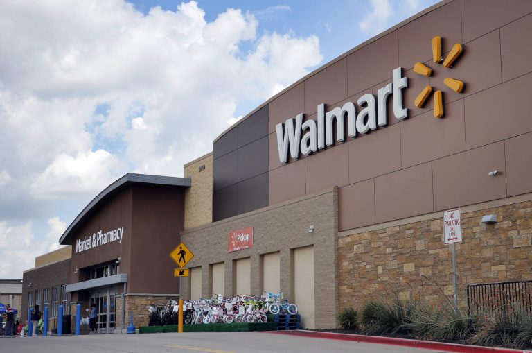 Hillary Clinton has sought to distance herself from Walmart's Walton family in recent years and has returned donations from the company in the past after they became controversial. (AP Photo)