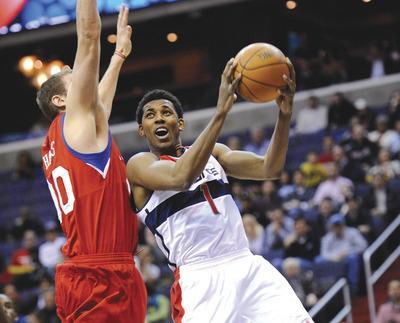 Nick Wass/AP
Guard Nick Young led the Wizards with 27 points in Sunday's loss to the 76ers, Washington's 11th defeat in 12 games to start the season.-