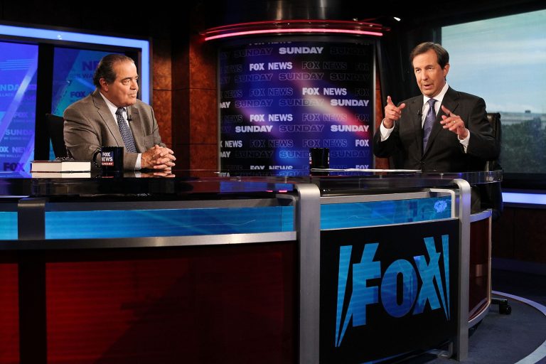 Chris Wallace (R) interviews U.S. Supreme Court Justice Antonin Scalia on 'FOX News Sunday' at the FOX News D.C. Bureau on July 27, 2012 in Washington, DC. (Photo by Paul Morigi/Getty Images)