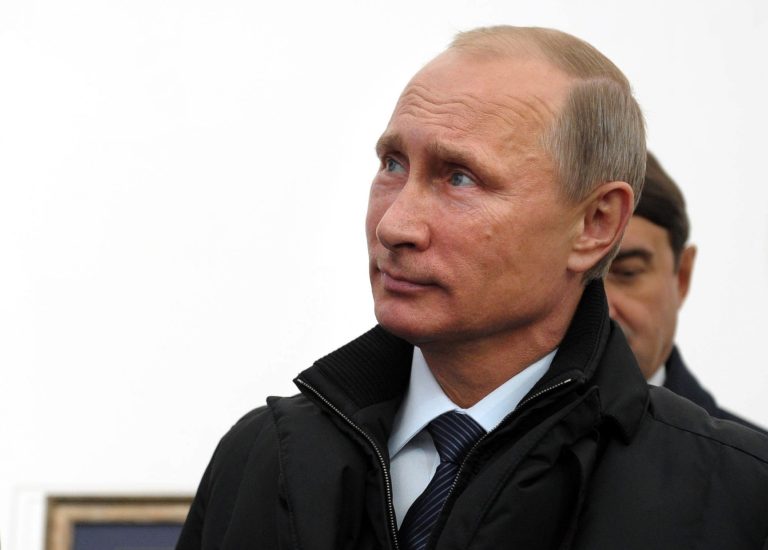 Russian President Vladimir Putin attends the unveiling of a bridge across the Ob River in Novosibirsk, southwestern part of Siberia, about 2,800 kilometers (1,750 miles) east of Moscow, Russia, Wednesday, Oct. 8, 2014.