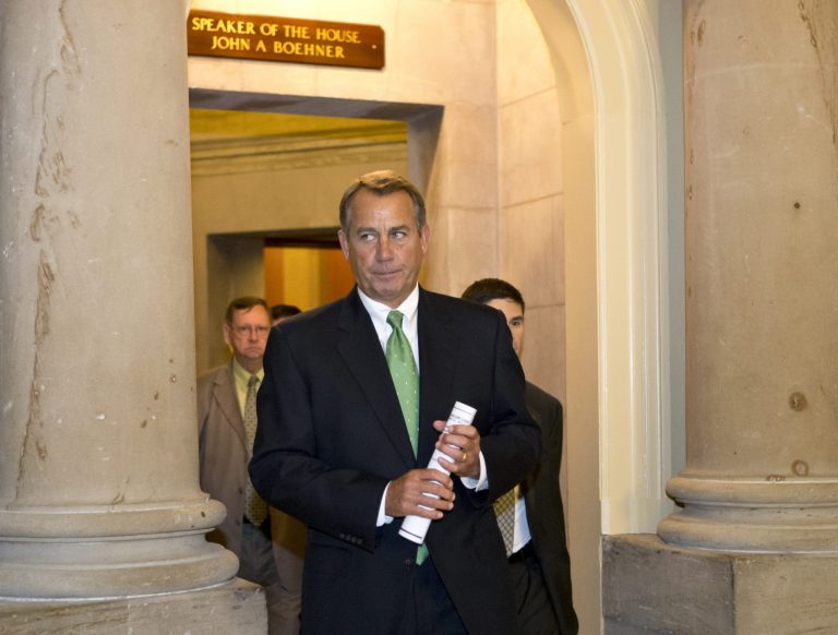   House Speaker John Boehner of Ohio leaves his office and walks to the House floor to deliver remarks about negotiations with President Obama on the fiscal cliff, Tuesday, Dec. 11, 2012, on Capitol Hill in Washington. (AP Photo/J. Scott Applewhite)  
