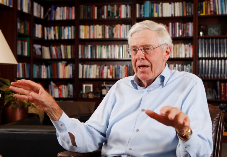 This photo taken May 22, 2012 shows Charles Koch in his office at Koch Industries in Wichita, Kansas, where Koch Industries manages 60,000 employees in 60 countries. The Kochs are demonized by Democrats, who lack a liberal equal to counter their weight, and not entirely understood by Republicans, who benefit from their seemingly limitless donations.  (AP Photo/The Wichita Eagle, Bo Rader)