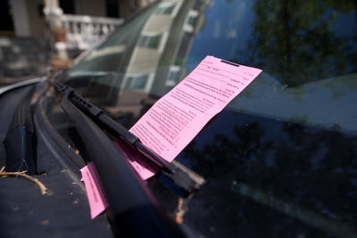A car in the District gets a parking citation. Parking spots are one of the city's most in-demand resources and the D.C. Council heard about a variety of parking complaints on June 27. (Graeme Jennings/Examiner file photo) 