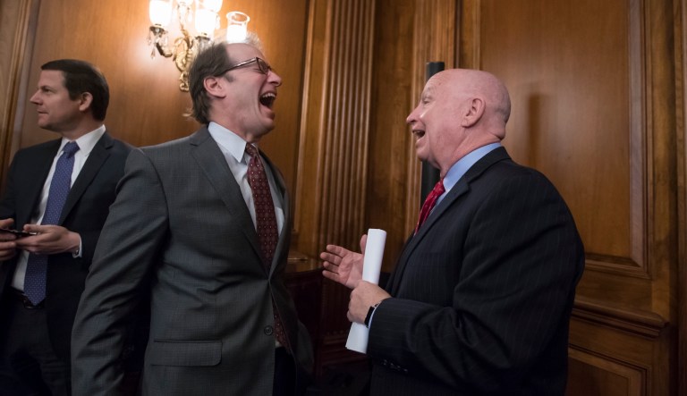 House Ways and Means Committee Chairman Kevin Brady, R-Texas, a steward of the GOP tax bill, and Rep. Peter Roskam, R-Ill., are both up for re-election this year. (AP Photo/J. Scott Applewhite)