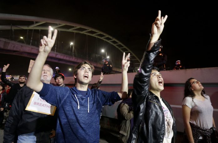 "Hands Up, Don't Shoot" quickly gained traction, and the story soon became part of a widely accepted narrative involving Michael Brown's death. (AP Photo)