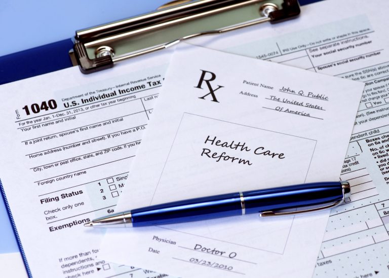 A multibillion-dollar tax that President Obama's health care law imposes on the insurance industry will be passed onto consumers, according to a new study by American Action Forum, costing individuals and families hundreds of dollars annually starting this year. (Photo: Thinkstock)