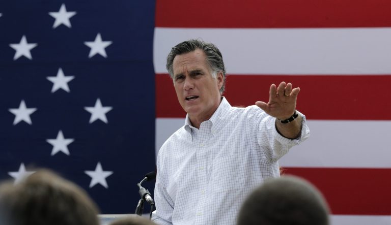 Mitt Romney, the former Republican presidential nominee, addresses a crowd of supporters while introducing New Hampshire Senate candidate Scott Brown at a farm in Stratham, N.H., Wednesday, July 2, 2014. (AP Photo/Charles Krupa)
