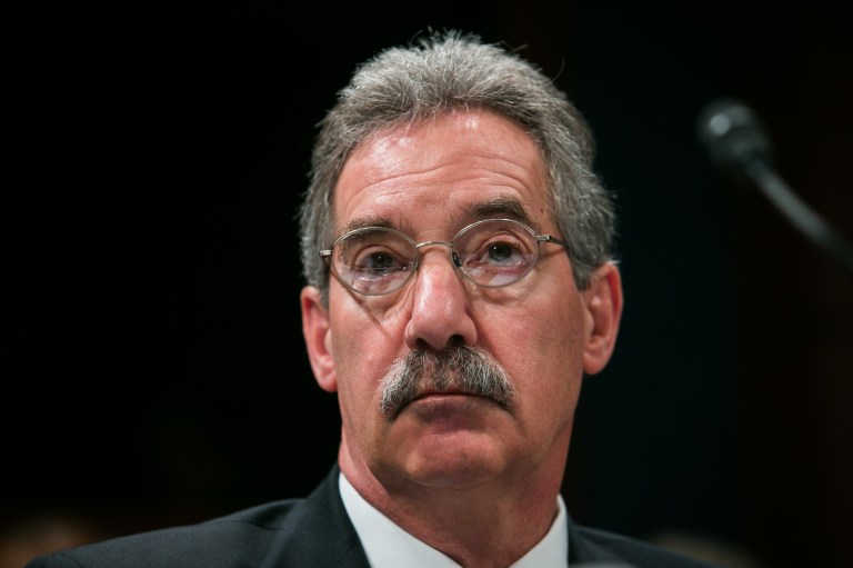 Deputy Attorney General James Cole pauses while testifying on Capitol Hill,Tuesday, October 29, 2013, before a House Intelligence Committee hearing. (Examiner/Graeme Jennings)