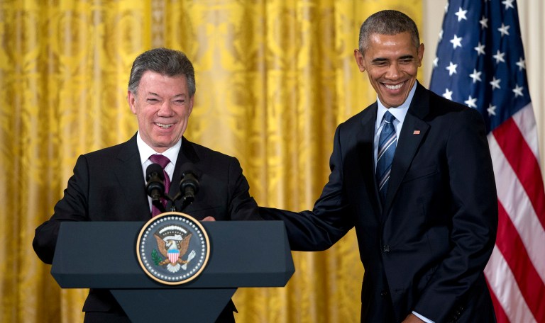 President Obama and top administration officials celebrated Colombian President Juan Manuel Santos on Friday. (AP Photo/Carolyn Kaster)