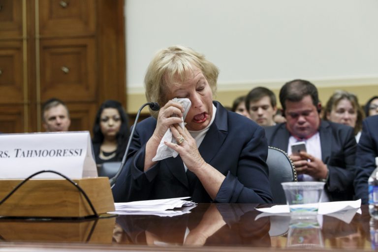 Jill Tahmooressi, mother of Marine Sgt. Andrew Tahmooressi of Weston, Fla., who has been held for six months in a Mexican jail, weeps after reading his letters from confinement and as others recount his heroism in Afghanistan, during a House Foreign Affairs subcommittee hearing on Capitol Hill in Washington, Wednesday, Oct. 1, 2014. Sgt. Tahmooressi, who suffers from post traumatic stress syndrome, claims he made an accidental wrong turn March 31 into a border-crossing point in Tijuana when he was arrested because he had guns in his vehicle.  (AP Photo/J. Scott Applewhite)