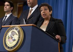 Justice Dept. to probe Chicago cops in killing of black teen