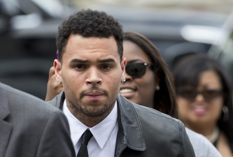 Singer Chris Brown arrives at the D.C. Superior Court, in Washington,Wednesday, June 25, 2014. Brown arrived for a hearing on the assault charge he faces.  Brown was arrested and charged with misdemeanor assault in October, accused of hitting a man outside the W hotel. That man says Brown hit him after he tried to get in a photograph that the singer was taking with two women. (AP Photo/Manuel Balce Ceneta)