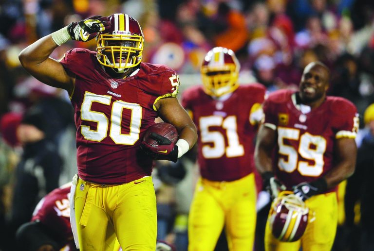 Rob Carr/Getty Images
Rob Jackson intercepted Tony Romo in the fourth quarter to set up the Redskins' final touchdown in a victory over the Cowboys on Sunday.