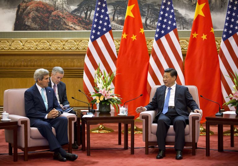 U.S. Secretary of State John Kerry, left, meets with Chinese President Xi Jinping, right, after attending the 6th U.S.-China Strategic and Economic Dialogue and 5th round of U.S. -China High Level consultation on People-to-people Exchange at the Great Hall of the People in Beijing, China Thursday, July 10, 2014. (AP Photo/Andy Wong, Pool)