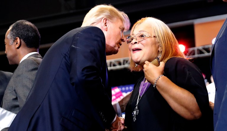 President Trump speaks to Alveda King, niece of Martin Luther King Jr., at a rally.