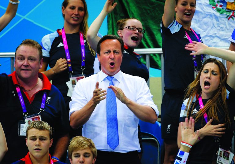 British Prime Minister David Cameron cheers for Eleanor Simmonds during her race in the Women's 200m IM SM6 Final at the 2012 Paralympics Olympics, Monday, Sept. 3, 2012, in London. (AP Photo / Emilio Morenatti)