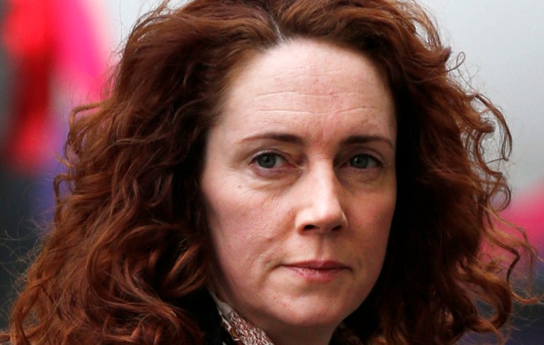 Former News of the World editor  Rebekah Brooks arrives at the Old Bailey in London as the phone hacking trial continues Tuesday Feb. 25, 2014. Brooks says she never sanctioned phone hacking, and was horrified when she learned the tabloid had targeted the phone of a missing teenager.  Brooks answered 