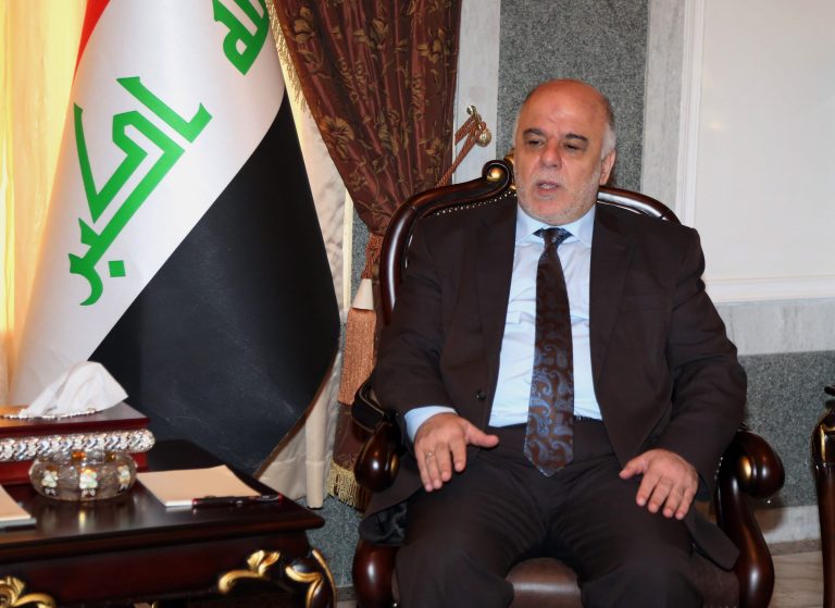 Iraqi premier-designate Haider al-Abadi meets with Pastor Farouk Yousuf in Baghdad, Iraq, Thursday, Aug. 21, 2014. Al-Abadi has until Sept. 11 to submit a list of Cabinet members to parliament for approval. Religious and ethnic minorities have called upon him to assemble an all-inclusive government. (AP Photo/Karim Kadim, Pool)