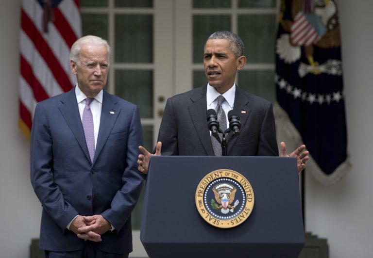 President Obama, accompanied by Vice President Joe Biden, speaks in the Rose Garden of the White House, Thursday, June 25, 2015, in Washington, after the U.S. Supreme Court upheld the subsidies for customers in states that do not operate their own exchanges under President Barack Obama's Affordable Care Act. (AP Photo/Carolyn Kaster)