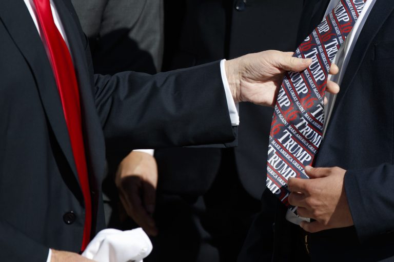 Maryland lacrosse player Dylan Maltz of Ashburn, Va., shows off his tie to President Donald Trump as Trump meets with NCAA championship teams at the White House, Friday, Nov. 17, 2017, in Washington. (AP Photo/Evan Vucci)