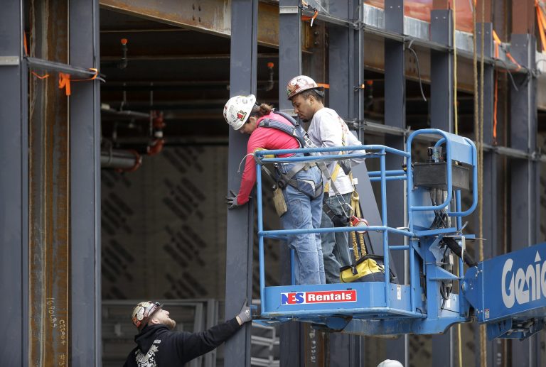 June's job gains exceeded economists' expectations for around 180,000 new jobs. (AP Photo/Steven Senne)