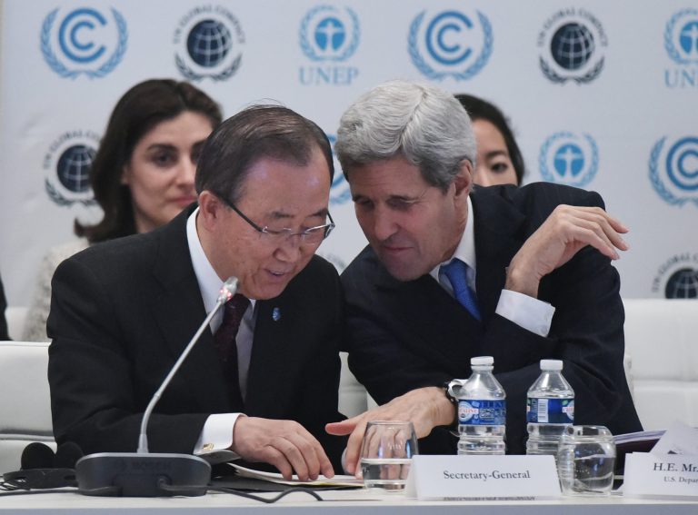 Secretary of State John Kerry, right, talks with UN Secretary General Ban Ki-moon during at the COP 21 conference on climate change. Reports from Paris show the U.S. is not in favor of limiting the increase in global temperature to 1.5 degrees Celsius but would like to get scientists' thoughts on how that level could be attained. (Mandel Ngan/Pool Photo via AP)
