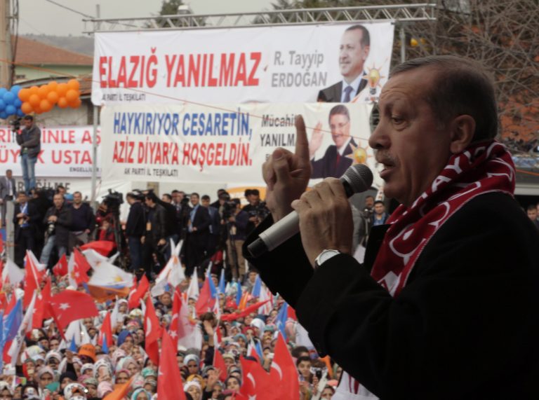 Turkish Prime Minister Recep Tayyip Erdogan addresses a rally of his Justice and Development Party in Elazig, Turkey, Thursday, March 6, 2014. Turkey hold nationwide municipality elections on March 30, 2014.(AP Photo/Burhan Ozbilici)