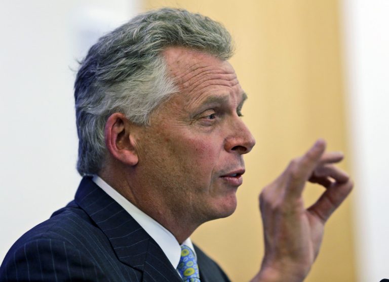 Virginia Gov-elect, Terry McAuliffe, gestures during a news conference to announce his transition team at the Capitol in Richmond, Va., Nov. 6.  McAuliffe defeated Ken Cucinelli to replace Bob McDonnell. (AP Photo/Steve Helber)