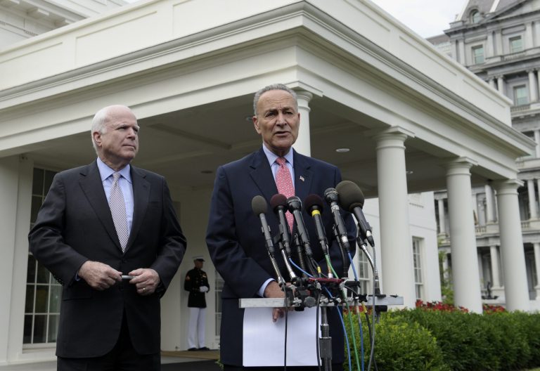 Sen. John McCain, R-Ariz., left, and Sen. Charles Schumer, D-N.Y., talk to reporters outside of the West Wing of the White House in Washington, Thursday, July 11, after their meeting on immigration reform with President Barack Obama.  (AP/Susan Walsh)