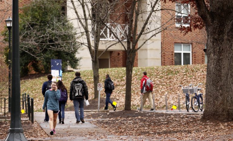 Students walk through the University of Virginia campus in Charlottesville, Va. (Photo by Jay Paul/Getty images)