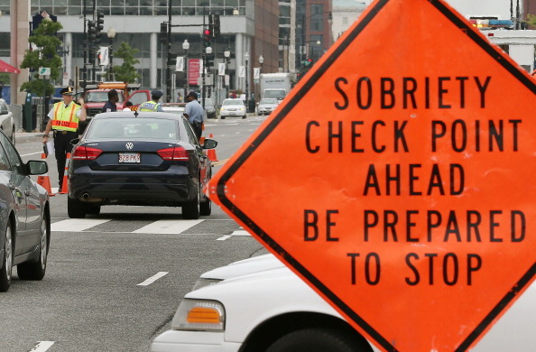 WASHINGTON, DC - AUGUST 14:  Washington Metropolitan Police conduct a sobriety check point associated with a news conference on drunk driving, on August 14, 2012 in Washington, DC. The National Highway Traffic Safety Administration (NHTSA) held a news conference to discuss the national anti-drunk driving campaign and law enforcement crackdown.  (Photo by Mark Wilson/Getty Images)